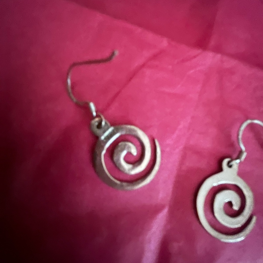 Silver artisan design dangle earrings